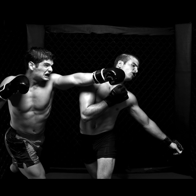 Inside Rumble Martial Arts: real photo of the mats and training equipment on the gym floor.