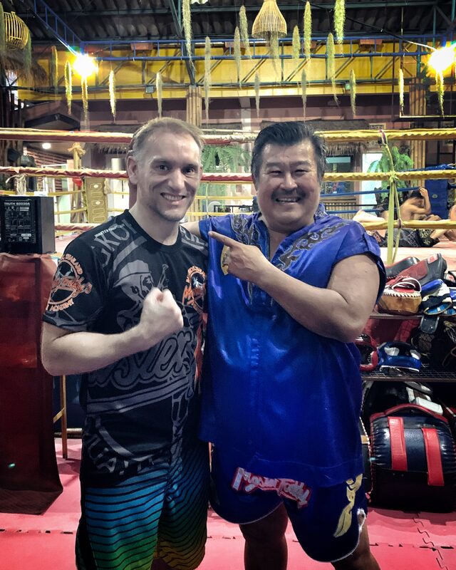 Our head instructor training ringside in Thailand with Master Toddy, the Thai government-certified Muay Thai teacher he holds his Kru certification under.