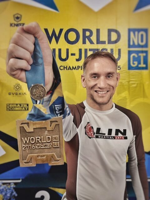 Our head instructor holding his bronze medal at the 2016 IBJJF World No-Gi Jiu-Jitsu Championship.